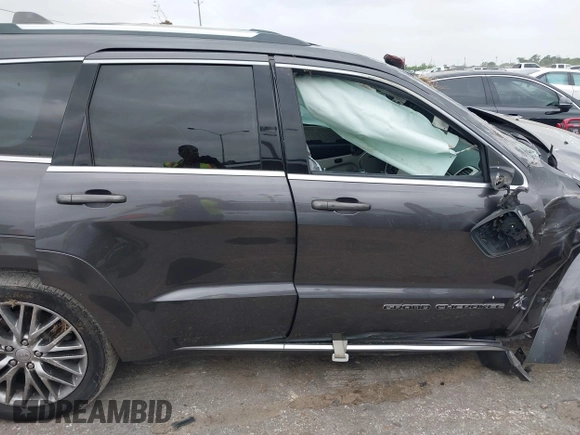2018 Jeep Grand Cherokee Summit with VIN 1C4RJFJT1JC370907, listed as a IAAI auction lot 41944933 with 110,597 mi miles and . Bid and sale history available at DreamBid. Image 12.