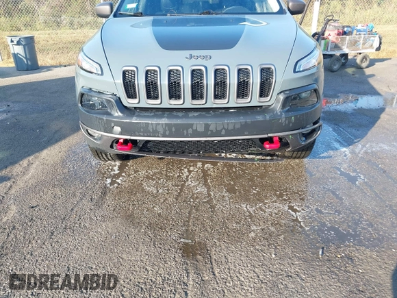 2014 Jeep Cherokee Trailhawk z VIN 1C4PJMBS2EW212341, wystawiony jako IAAI lot #40672694 z przebiegiem 108 622 mil mil oraz . Historia ofert i sprzedaży dostępna na DreamBid. Obrazek 6.