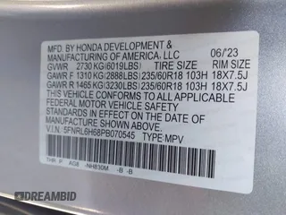 2023 Honda Odyssey EX-L with VIN 5FNRL6H68PB070545, listed as a IAAI auction lot 41331357 with 13,448 mi miles. Bid and sale history available at carsss.com. Image 9.