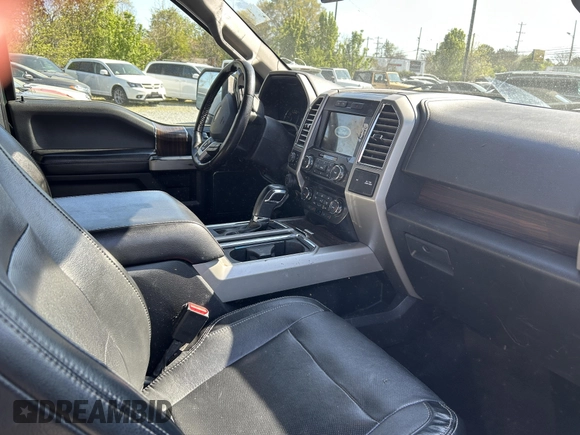 2016 Ford F-150 XLT with VIN 1FTFW1EG4GKE48227, listed as a IAAI auction lot 41907752 with 233,964 mi miles. Bid and sale history available at carsss.com. Image 5.