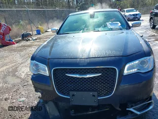 2016 Chrysler 300 with VIN 2C3CCAEG1GH320292, listed as a IAAI auction lot 41220208 with 125,762 mi miles. Bid and sale history available at carsss.com. Image 13.