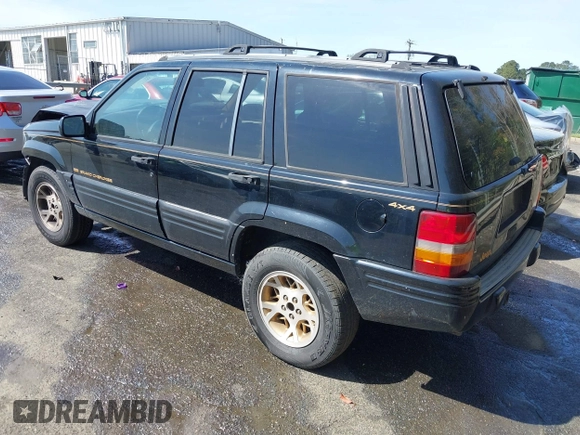 1997 Jeep Grand Cherokee Limited with VIN 1J4GZ78Y1VC658515, listed as a IAAI auction lot 41897266 with 164,033 mi miles and . Bid and sale history available at DreamBid. Image 3.