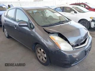 2007 Toyota Prius z VIN JTDKB20UX73281542, wystawiony jako IAAI lot #42449989 z przebiegiem 164 111 mil mil oraz . Historia ofert i sprzedaży dostępna na DreamBid. Obrazek 1.