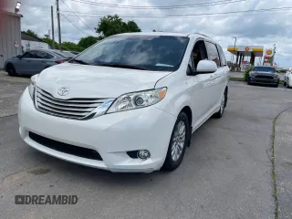 2016 Toyota Sienna XLE with VIN 5TDYK3DC3GS761177, listed as a Copart auction lot 61506935 with 134,732 mi miles and Clean title. Bid and sale history available at DreamBid. Image 2.