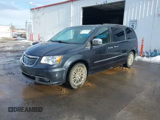 2014 Chrysler Town & Country Touring-L with VIN 2C4RC1CG4ER330072, listed as a IAAI auction lot 41533640 with 131,253 mi miles. Bid and sale history available at carsss.com. Image 17.