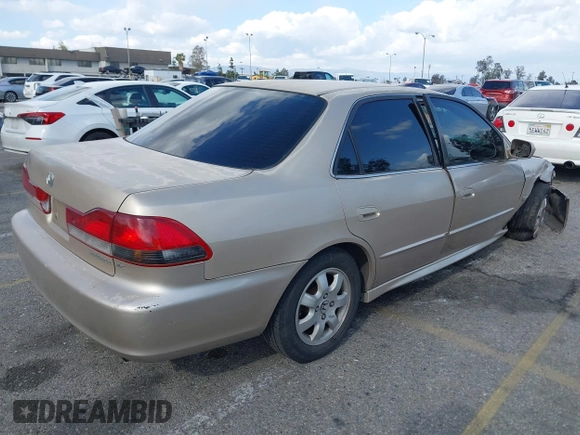 2001 Honda Accord EX z VIN 1HGCG66821A084618, wystawiony jako IAAI lot #41959020 z przebiegiem 272 671 mil mil oraz . Historia ofert i sprzedaży dostępna na DreamBid. Obrazek 4.