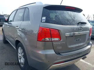 2013 Kia Sorento SX with VIN 5XYKWDA2XDG323728, listed as a IAAI auction lot 41781689 with 168,069 mi miles. Bid and sale history available at carsss.com. Image 3.