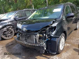 2015 Toyota Sienna XLE with VIN 5TDYK3DC8FS574645, listed as a IAAI auction lot 42528851 with 164,408 mi miles and . Bid and sale history available at DreamBid. Image 6.