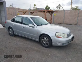 2003 Saturn LS with VIN 1G8JU54F43Y530377, listed as a IAAI auction lot 41487782 with 160,983 mi miles. Bid and sale history available at carsss.com. Image 1.