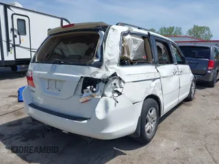 2007 Honda Odyssey EX-L with VIN 5FNRL38617B141003, listed as a IAAI auction lot 39232543 with 195,096 mi miles and . Bid and sale history available at DreamBid. Image 4.