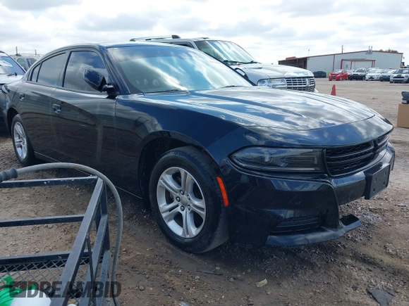 2023 Dodge Charger SXT with VIN 2C3CDXBG2PH550671, listed as a IAAI auction lot 42123200 with 50,818 mi miles. Bid and sale history available at carsss.com. Image 1.