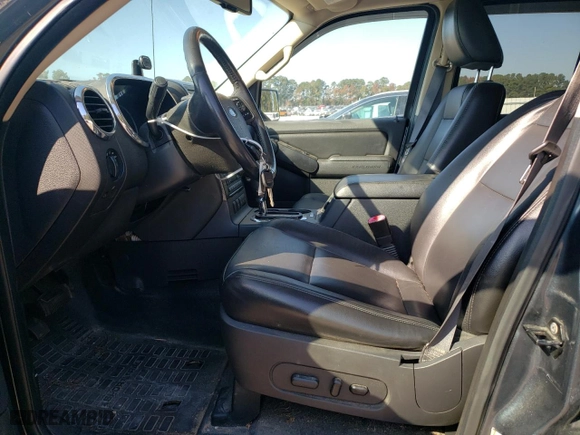 2010 Ford Explorer Sport Trac Limited with VIN 1FMEU3DE7AUA02366, listed as a Copart auction lot 76955404 with 128,751 mi miles and Salvage Title. Bid and sale history available at carsss.com. Image 7.