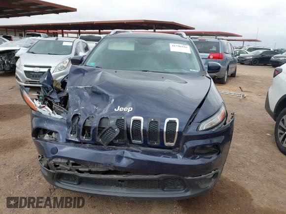 2015 Jeep Cherokee Latitude with VIN 1C4PJLCB8FW506398, listed as a IAAI auction lot 41796516 with 95,204 mi miles and . Bid and sale history available at DreamBid. Image 11.