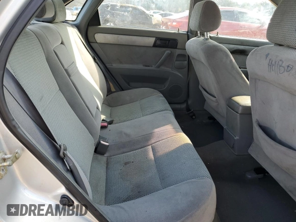 2006 Suzuki Forenza z VIN KL5JD56Z66K299816, wystawiony jako Copart lot #81893914 z przebiegiem 156 416 mil mil oraz Szkoda całkowita • Salvage title. Historia ofert i sprzedaży dostępna na DreamBid. Obrazek 10.