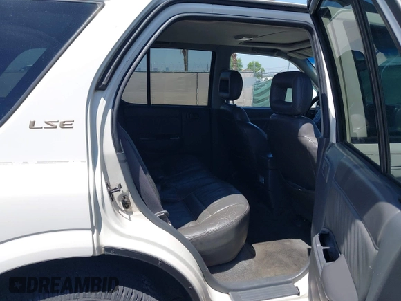1999 Isuzu Rodeo S with VIN 4S2CK58W7X4325703, listed as a IAAI auction lot 42715480 with 205,420 mi miles and . Bid and sale history available at DreamBid. Image 8.