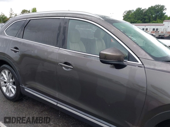 2016 Mazda CX-9 Grand Touring с VIN JM3TCADY6G0126391, выставлен на аукционе IAAI как лот 42242541 с пробегом 45 147 миль миль и . История ставок и продаж доступна на DreamBid. Изображение 13.