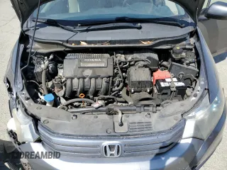 2010 Honda Insight EX with VIN JHMZE2H7XAS021268, listed as a Copart auction lot 54179245 with 211,561 mi miles and Salvage Title. Bid and sale history available at DreamBid. Image 11.