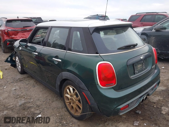 2015 MINI Hardtop 4 Door S with VIN WMWXU3C5XF2B59066, listed as a IAAI auction lot 40900773 with 14,618 mi miles and . Bid and sale history available at DreamBid. Image 3.