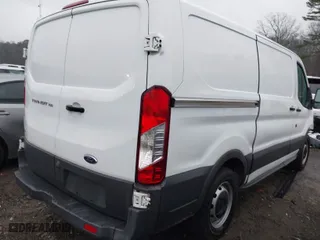 2016 Ford Transit Cargo Van with VIN 1FTYE1YM1GKA93045, listed as a IAAI auction lot 41521031 with 189,384 mi miles. Bid and sale history available at carsss.com. Image 4.