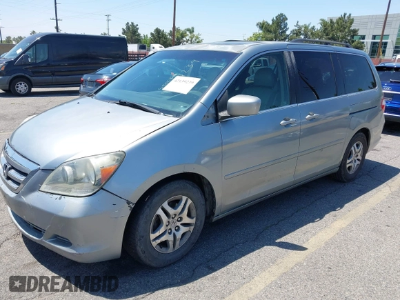 2007 Honda Odyssey EX-L with VIN 5FNRL38777B016421, listed as a IAAI auction lot 42139239 with 286,558 mi miles. Bid and sale history available at carsss.com. Image 2.