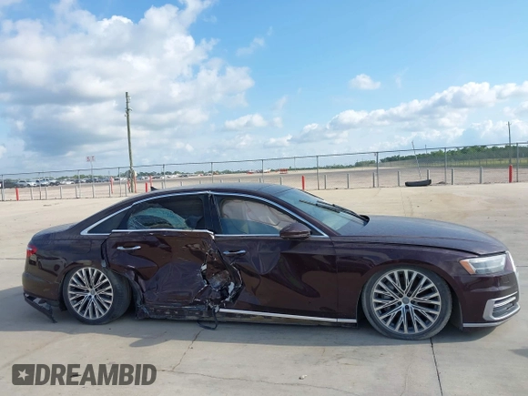 2019 Audi A8 z VIN WAU8DAF85KN004784, wystawiony jako IAAI lot #42414695 z przebiegiem Nie podano mil oraz . Historia ofert i sprzedaży dostępna na DreamBid. Obrazek 12.