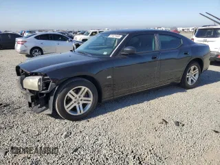 2007 Dodge Charger z VIN 2B3KA43G27H699497, wystawiony jako Copart lot #57421555 z przebiegiem 266 981 mil mil oraz Szkoda całkowita • Salvage title. Historia ofert i sprzedaży dostępna na DreamBid. Obrazek 1.