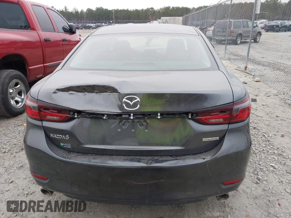 2021 Mazda Mazda6 Touring with VIN JM1GL1VM9M1603830, listed as a IAAI auction lot 41531133 with 73,588 mi miles. Bid and sale history available at carsss.com. Image 16.