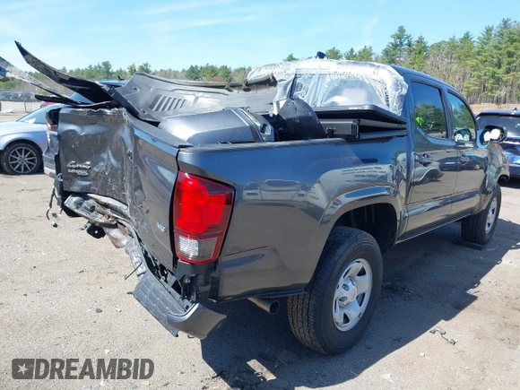 2023 Toyota Tacoma SR with VIN 3TMCZ5AN0PM614127, listed as a IAAI auction lot 41974924 with 12,674 mi miles and . Bid and sale history available at DreamBid. Image 4.
