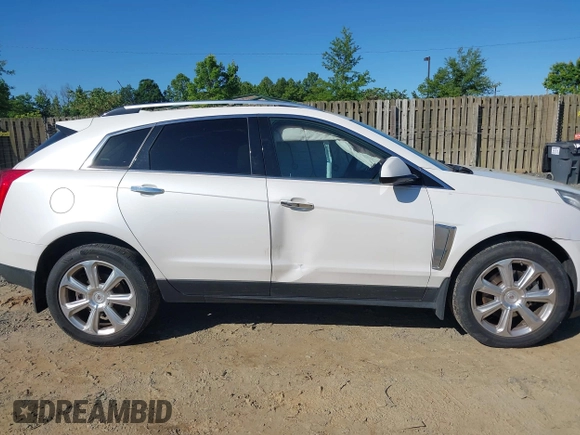 2013 Cadillac SRX Performance Collection with VIN 3GYFNHE31DS597987, listed as a IAAI auction lot 42319058 with 139,670 mi miles and . Bid and sale history available at DreamBid. Image 13.