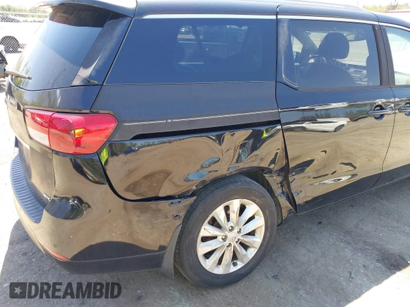 2016 Kia Sedona SX with VIN KNDMC5C15G6143818, listed as a IAAI auction lot 42051284 with 97,666 mi miles and . Bid and sale history available at carsss.com. Image 6.
