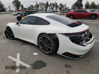 2021 Porsche 911 Carrera with VIN WP0AA2A99MS205692, listed as a Copart auction lot 45731394 with 24,627 mi miles. Bid and sale history available at carsss.com. Image 2.