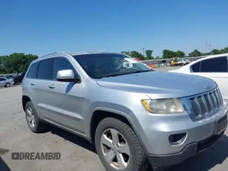 2012 Jeep Grand Cherokee Laredo with VIN 1C4RJEAG5CC112230, listed as a IAAI auction lot 41997483 with 302,923 mi miles. Bid and sale history available at carsss.com. Image 13.
