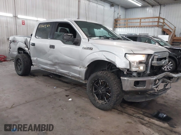 2015 Ford F-150 XLT with VIN 1FTEW1E89FFA44710, listed as a IAAI auction lot 41521584 with 158,297 mi miles. Bid and sale history available at carsss.com. Image 1.
