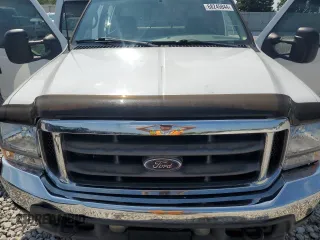 2002 Ford Super Duty F-250 XL with VIN 1FTNW21F72ED29593, listed as a Copart auction lot 68245844 with 301,129 mi miles and Salvage Title. Bid and sale history available at carsss.com. Image 13.