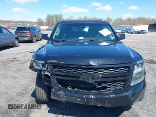 2015 Chevrolet Suburban LT z VIN 1GNSKJKC2FR162921, wystawiony jako IAAI lot #41961114 z przebiegiem 296 918 mil mil oraz . Historia ofert i sprzedaży dostępna na DreamBid. Obrazek 13.