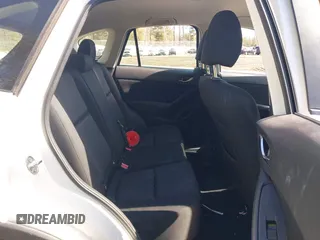 2016 Mazda CX-5 Sport with VIN JM3KE2BY9G0887110, listed as a IAAI auction lot 41761039 with 86,624 mi miles. Bid and sale history available at carsss.com. Image 8.