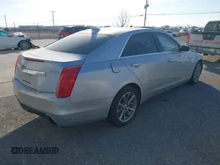 2019 Cadillac CTS Luxury RWD with VIN 1G6AR5SX7K0110826, listed as a IAAI auction lot 41596118 with 58,387 mi miles and . Bid and sale history available at DreamBid. Image 4.