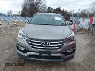 2017 Hyundai Santa Fe 2.4L with VIN 5XYZU3LB4HG424734, listed as a IAAI auction lot 41491166 with 130,905 mi miles and . Bid and sale history available at DreamBid. Image 12.