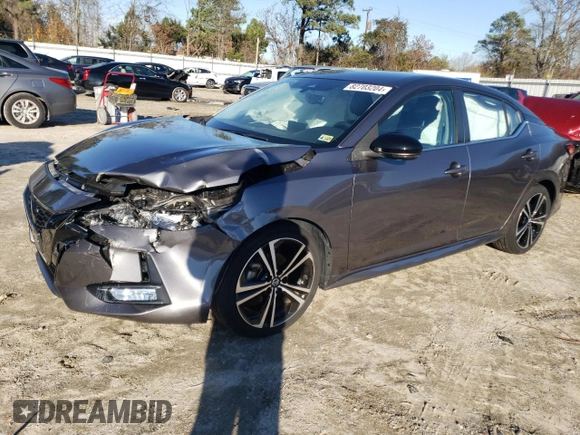 2021 Nissan Sentra SR with VIN 3N1AB8DV9MY330639, listed as a Copart auction lot 82703204 with 23,044 mi miles and Salvage Title. Bid and sale history available at DreamBid. Image 1.