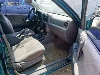 1999 Isuzu Rodeo S с VIN 4S2CK58W6X4366887, выставлен на аукционе Copart как лот 47527309 с пробегом 177 199 миль миль и Списание • Salvage title. История ставок и продаж доступна на DreamBid. Изображение 5.