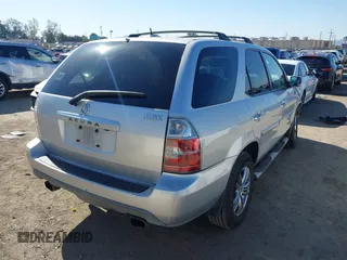 2005 Acura MDX Touring with VIN 2HNYD18915H520415, listed as a IAAI auction lot 42012458 with 219,246 mi miles. Bid and sale history available at carsss.com. Image 4.