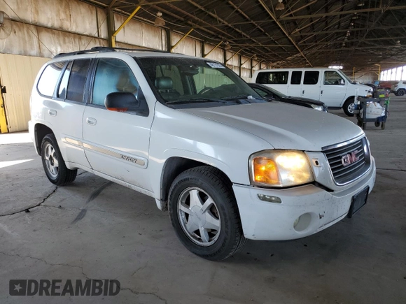2002 GMC Envoy SLT with VIN 1GKDT13S922128924, listed as a Copart auction lot 46131035 with 162,499 mi miles and Salvage Title. Bid and sale history available at carsss.com. Image 4.