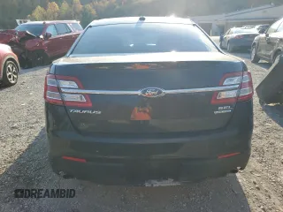 2015 Ford Taurus SEL z VIN 1FAHP2E85FG151155, wystawiony jako Copart lot #77791634 z przebiegiem 224 144 mil mil oraz Szkody całkowita. Historia ofert i sprzedaży dostępna na DreamBid. Obrazek 6.