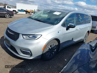 2023 Chrysler Pacifica Hybrid Limited with VIN 2C4RC1S78PR551260, listed as a IAAI auction lot 41992752 with 55,136 mi miles and . Bid and sale history available at DreamBid. Image 2.