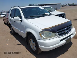 2000 Mercedes-Benz M 320/430/500 with VIN 4JGAB54E5YA157431, listed as a IAAI auction lot 42472892 with 125,973 mi miles and . Bid and sale history available at DreamBid. Image 1.