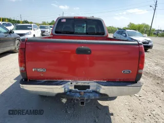 1998 Ford F-150 with VIN 1FTZX1765WKA88964, listed as a Copart auction lot 57334945 with 172,672 mi miles and Salvage title. Bid and sale history available at DreamBid. Image 6.
