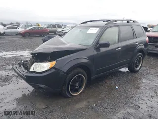 2012 Subaru Forester 2.5X Limited with VIN JF2SHAEC0CH436994, listed as a IAAI auction lot 41472765 with 125,606 mi miles. Bid and sale history available at carsss.com. Image 2.