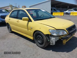 2002 Mitsubishi Lancer OZ-Rally z VIN JA3AJ86EX2U073129, wystawiony jako IAAI lot #42337379 z przebiegiem 257 556 mil mil oraz . Historia ofert i sprzedaży dostępna na DreamBid. Obrazek 1.