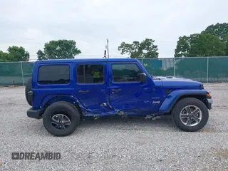 2019 Jeep Wrangler Unlimited Sahara with VIN 1C4HJXEG1KW599117, listed as a IAAI auction lot 42602241 with 109,552 mi miles and . Bid and sale history available at DreamBid. Image 13.
