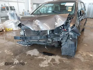 2012 Toyota Sienna with VIN 5TDKA3DC0CS012095, listed as a IAAI auction lot 41317071 with Not Provided miles and . Bid and sale history available at DreamBid. Image 6.